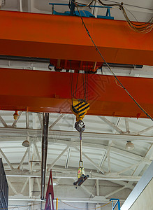 企业货物的工厂桥起重机工具建筑橙子工作金属机械运输机器安全工程图片