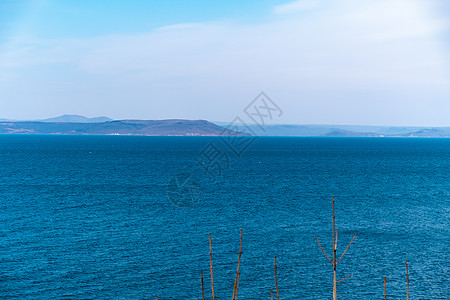 来自海参松市的阿穆尔湾景象海岸商业摩天大楼支撑喇叭建筑学地平线车站中心边缘图片