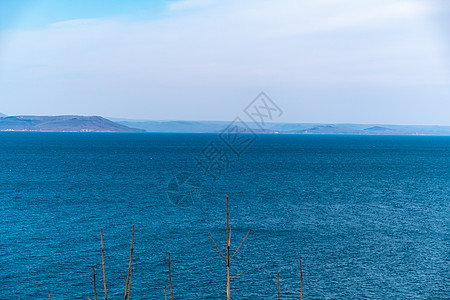 来自海参松市的阿穆尔湾景象港口全景旅行运输天空摩天大楼货物起重机中心车站图片