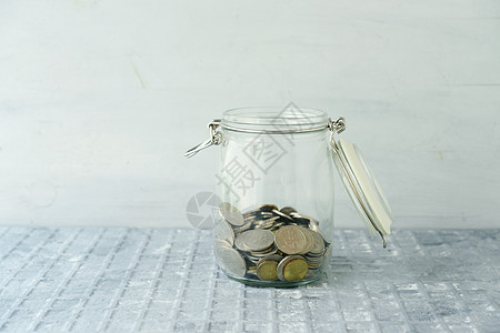 用硬币保存罐尖端订金经济货币现金商业房子退休金融小猪图片