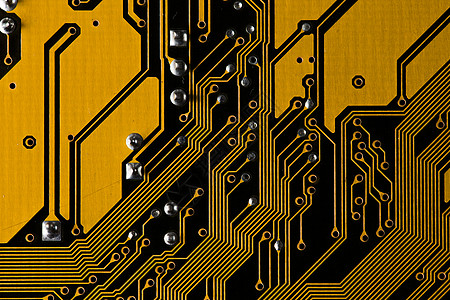 黄色印刷电路板的宏观图片PCB 纹理电路卡片处理器电阻器记忆信号电容器数据半导体芯片图片