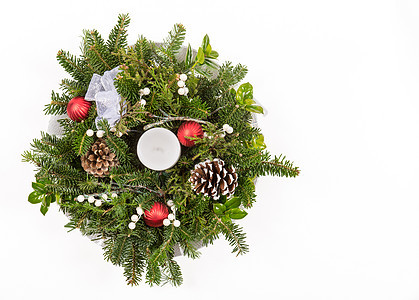 圣诞节装饰植物群装饰品展示假期针叶锥体松果火花松树丝带图片