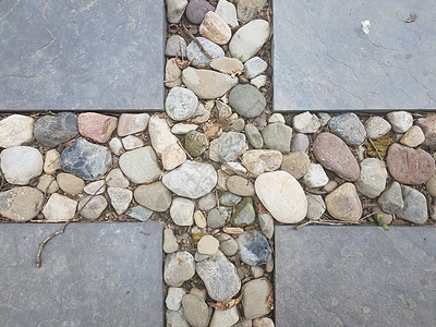 灰色平方瓷砖以及石头和石块鹅卵石岩石垫脚正方形碎石长方形背景图片