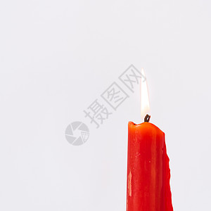 演播室拍摄了一部烧着亚洲红蜡烛的摄影棚悲哀宏观烛光念日大教堂庆典点火火焰辉光派对图片