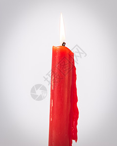 经过过滤的图像演播室拍摄了 一条亚洲红蜡烛烛光念日冥想燃烧派对宗教圆柱大教堂庆典仪式图片