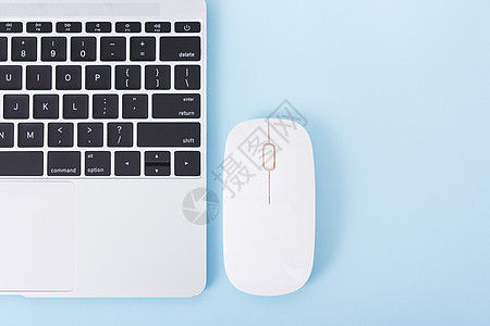 顶端查看笔记本电脑笔记本和无线鼠标咖啡职场教育桌子商业屏幕键盘蓝色空气办公室图片