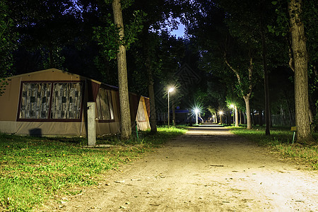 露营帐篷旅游娱乐日落假期营地太阳公园闲暇活动森林图片