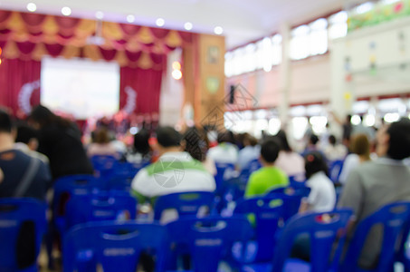 模糊的人群会议室演讲习俗工作桌子团队扬声器房间观众中心团体图片