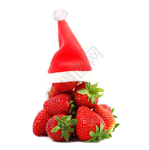 白背景的草莓 带有圣诞帽图片