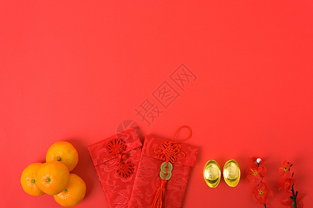 中华新年节的概念 平坦的天观桌子节日假期水果金子橙子月球信封繁荣装饰图片
