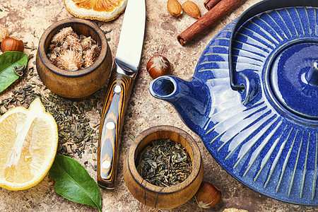 茶水和茶叶原料香气柠檬芳香茶壶桌子商品用具礼仪榛子陶器图片