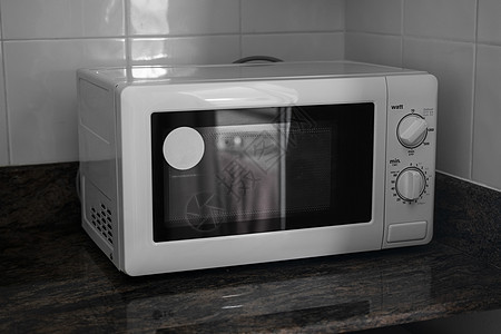 在厨房里做饭或取暖的微波炉器具房子电气厨具金属电子产品柜台用具炊具家庭图片