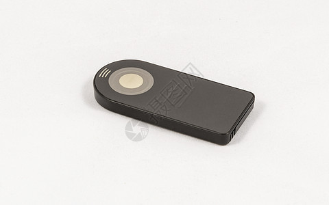 DSLR 相机的小黑色无品牌遥控器控制器灰色电子按钮红色渠道收音机白色塑料程序图片