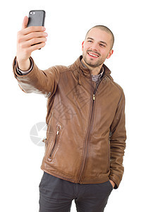 采取自拍相机照片技术男性快乐微笑电话白色乐趣成人图片