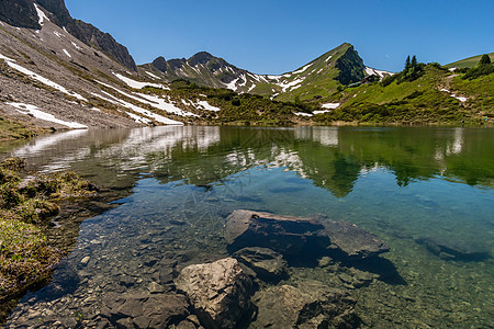 坦尼海山的奇妙远足山坡石墙岩石碎石茅屋蕾丝全景石头农村登山图片