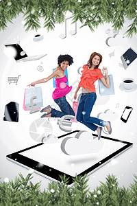 两个微笑的女人在平板电脑 p 上跳跃的合成图像触摸屏购物女性快乐计算机电子商务沟通微笑货币下雪图片