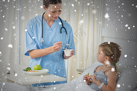 医生为生病女孩提供膳食的综合形象图片