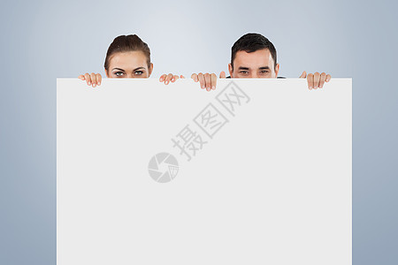 商业伙伴隐藏在一个标志背后的复合图象卡片女士双手女性计算机商务展示桌子控制板混血图片