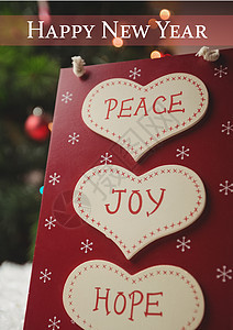 带着和平 喜悦和希望的信息 祝愿新年快乐宗教假期家庭庆典文化传统标签绳索装饰风格背景图片