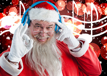 听音乐耳机的圣诞老人图片