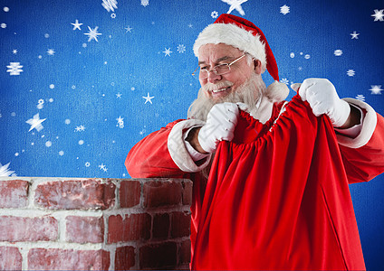 圣诞老人把礼物袋放在烟囱里庆典手套假期下雪雪花奇观盒子喜庆天气戏服图片
