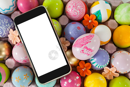 喷漆的复活节鸡蛋上的移动电话耐力手机闲暇宗教创造力展示情怀季节技术屏幕图片