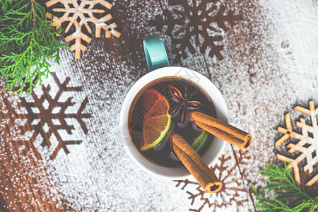 圣诞节节日概念饮料杯子调子手工围巾肉桂针织卡片桌子香料图片