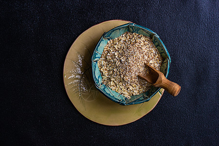 健康食品概念与燕麦米薄片食物桌子粮食燕麦谷物制品陶瓷小麦饮食背景图片