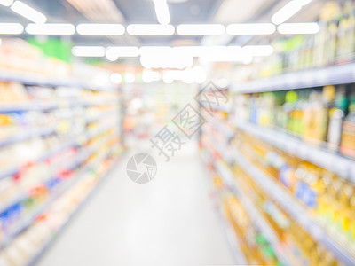 摘要模糊的超市背景送货架子购物走道销售美食部门消费者杂货店图片
