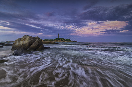 Ke Ga灯塔 在越南中部Binh Thuan的Phan Thiet有名的访问地点旅行地标安全地平线多云岩石支撑冲浪全景日落图片