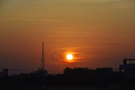 太阳升起的美容地平线沙丘地形阳光日落橙子旅行丘陵薄雾天空图片