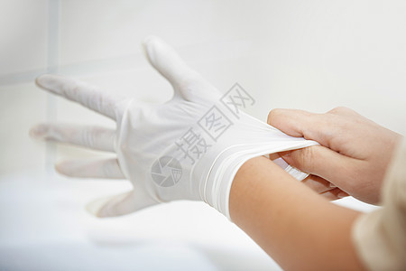 戴橡胶手套的人的手卫生橡皮女性保健风险生活方式衣服身体生活一部分图片