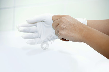 戴橡胶手套的人的手水平一部分生活女士女孩生活方式风险消毒身体手臂图片