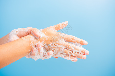 妇女用肥皂洗手时有泡沫棕榈病菌药品程序身体女士护士手指清洁度消毒图片