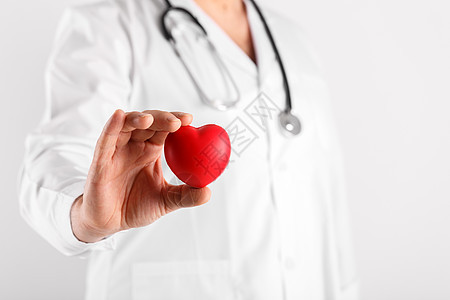 男医生握着心的手援助心脏病专家临床药品医师医院职业诊所工人图片