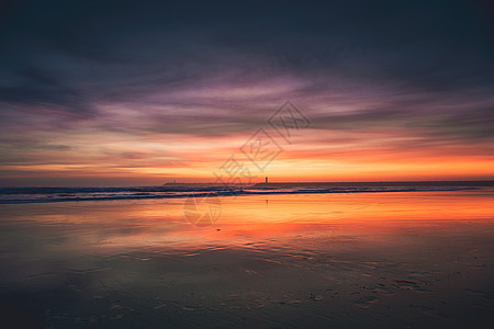 海边天空日落海滩日出太阳阳光场景波浪反射季节海岸线天空蓝色背景