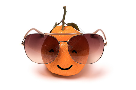 面带眼眼镜的橙色笑脸 白色背景素描情感微笑乐趣快乐幸福橙子舌头想像力眼镜图片