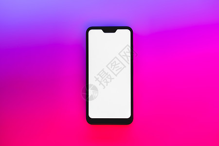 霓虹灯背景下的现代通用智能手机展示辉光屏幕色域电话红色紫色白色空间图片