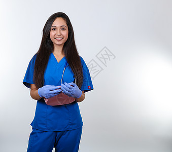 蓝灌丛中微笑的护士 Bedpan控床图片