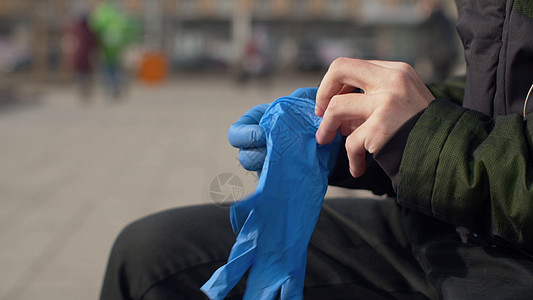 男人戴防护手套的人安全呼吸医疗感染危害卫生生物晴天危险男性图片