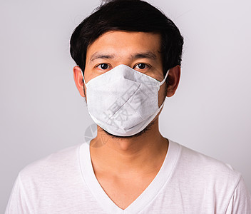 戴外科手术卫生防护服的男子面罩安全预防流感保健男性呼吸感染织物病菌男人图片