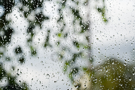 窗玻璃上的雨滴 雨中窗外模糊的背景下雨阴雨环境房子天气淋浴反射季节窗格水分图片