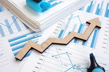 商业增长概念 附有图表和箭头的财务报告图片