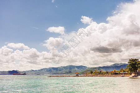 海岸 巴厘岛东南面的印度尼西亚海浪旅游别墅热带海滩冲浪休息假期旅行码头图片