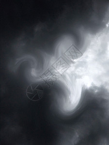 黑暗密集阴沉戏剧性的雷云季节阳光场景湍流漩涡风暴天气风景黑色白色图片