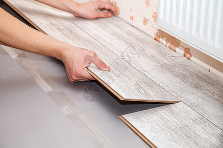 人铺层层的地板房间建设者工人职业木板工作工具成人男人维修图片