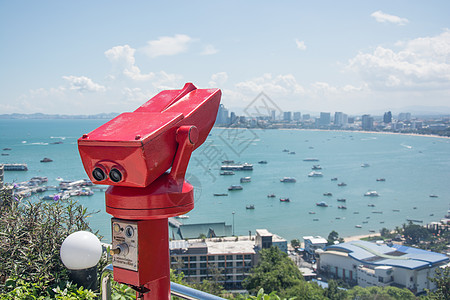 红色相机 空中放大照片景点城市眼镜摄影设备建筑物观众旅游望远镜天线图片