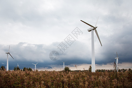 现场现代风车蓝色草地生态涡轮太阳车站创新技术金属天空图片
