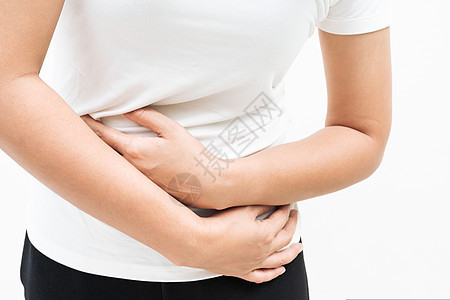 患有腹部疼痛 胃痛的年轻妇女 s伤害疾病胃炎家具诊所便秘腹泻公寓症状医生图片