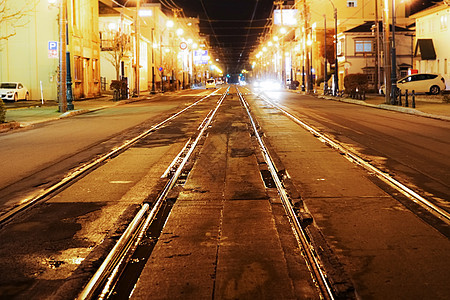 铁轨街道现代城市夜间夜景图片